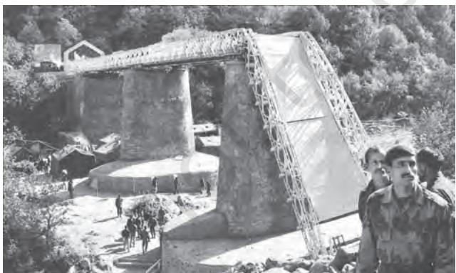 A view of the damaged Aman Setu at the LOC in Uri, due to an earthquake