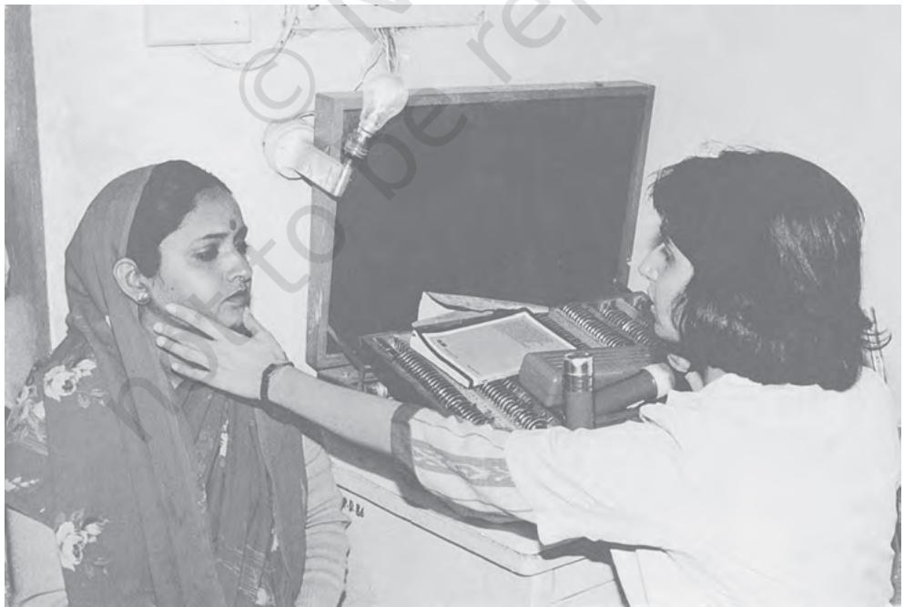 A doctor checking a patient