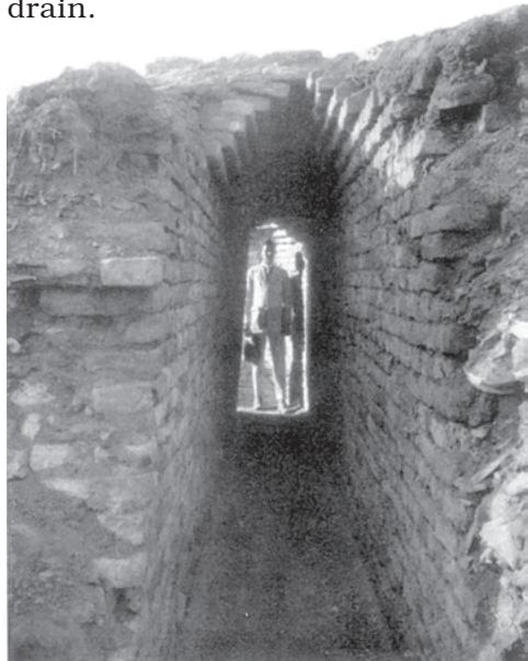 Fig. 1.8
A drain in Mohenjodaro
Notice the huge opening of the drain.
