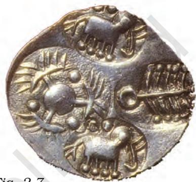 Fig. 2.7
A punch-marked coin, so named because symbols were punched or stamped onto the metal surface