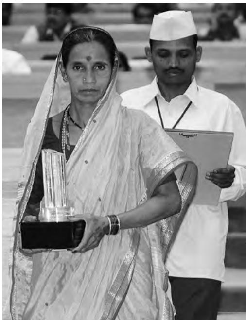 A woman Panch with her reward